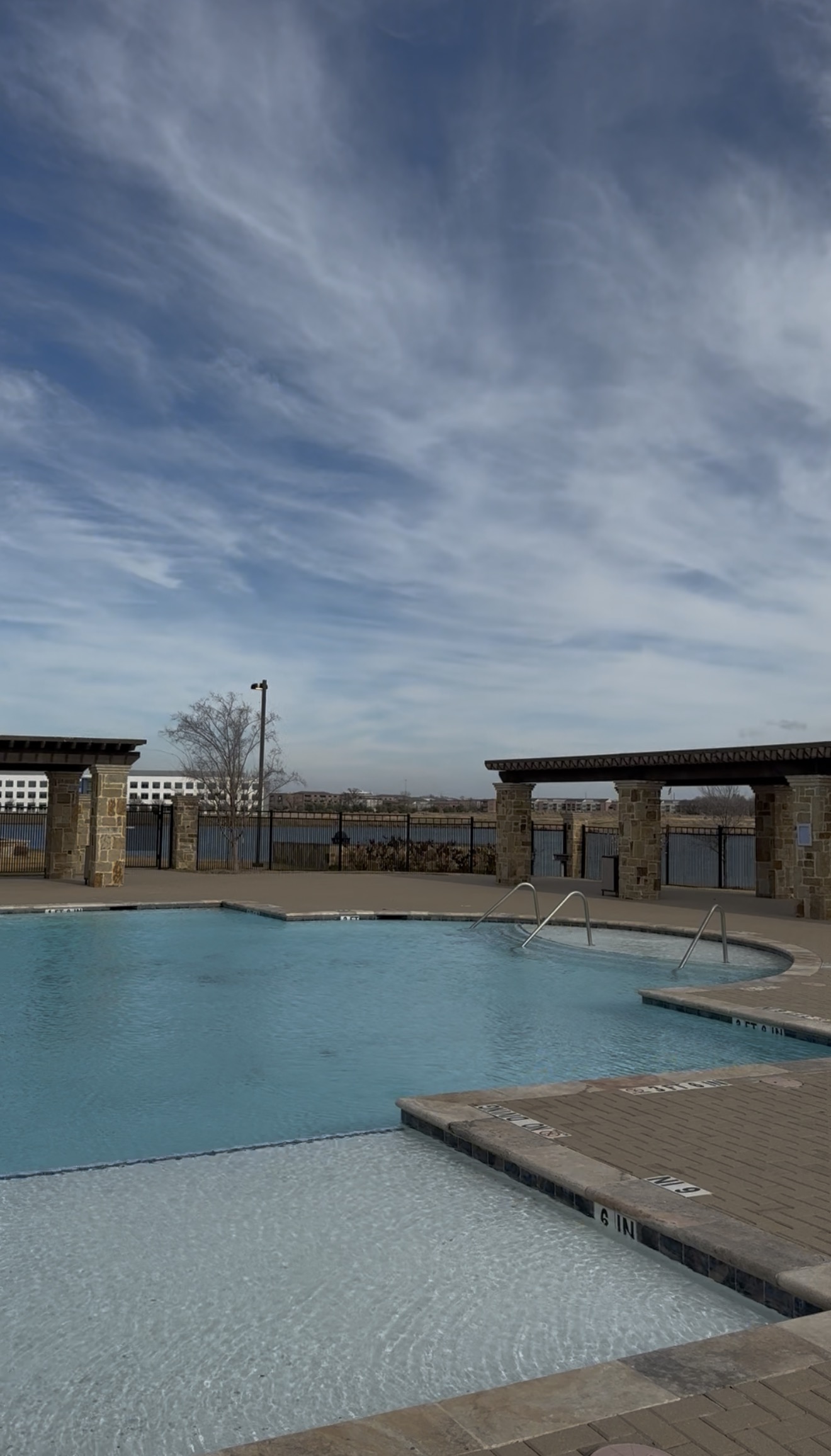 Resort-style pool at Mercer Residential West highlighting upgraded HOA amenities and community transformation
