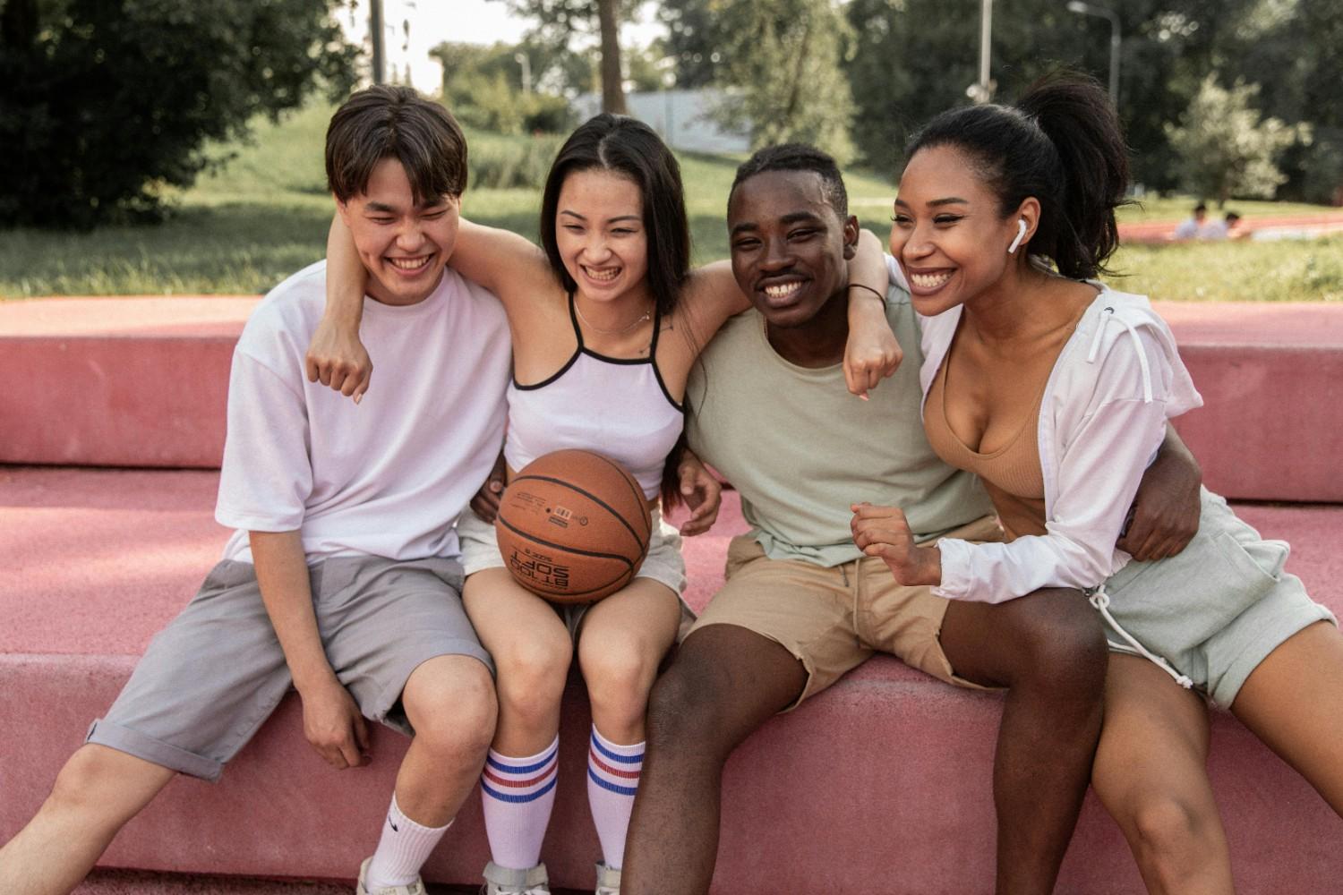 Friends socializing at a recreational area in an Austin community.