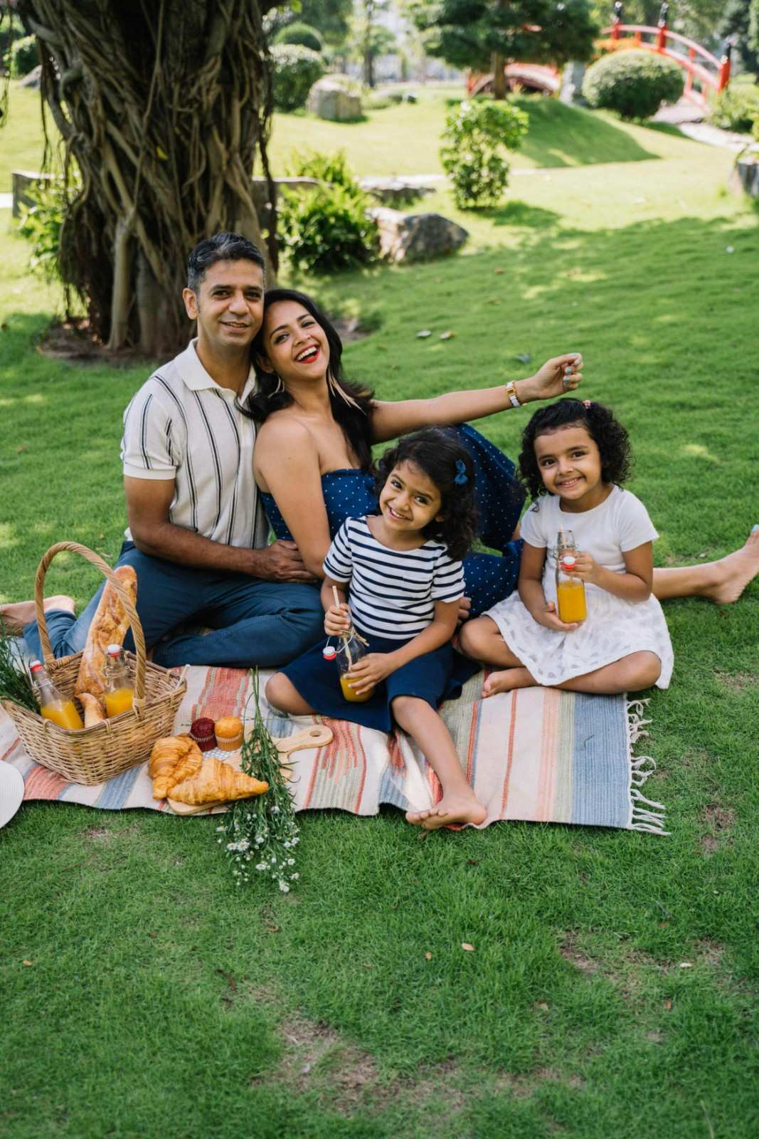 Family enjoying a picnic in a community green space in Austin.